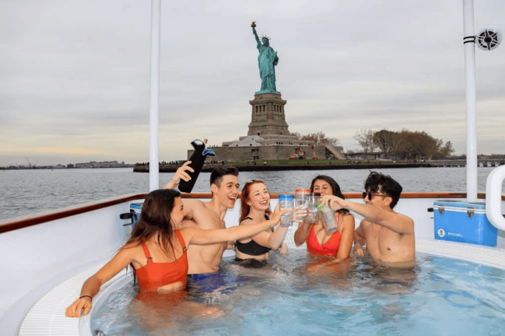 a group of people swimming in a pool of water